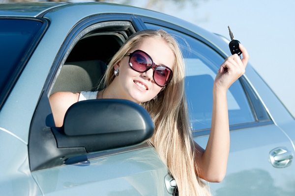 young woman with car keys