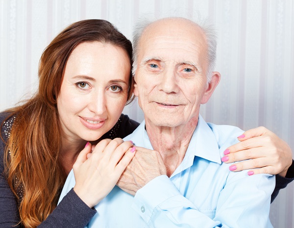 elderly man and caregiver