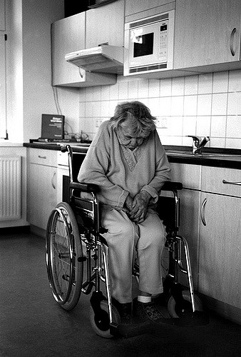 elderly woman in wheelchair