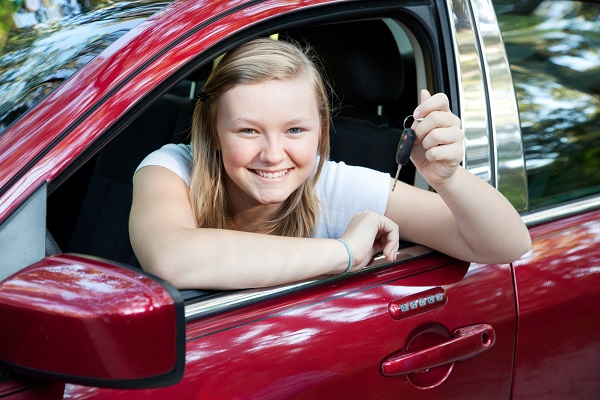 teen holding car keys